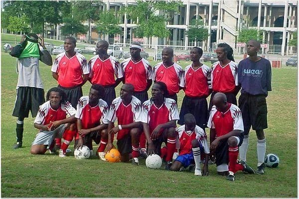 JFC in red shirts posing for a team photo in summer 2007
